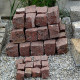 Granit-Pflastersteine Raudona rot verlegt detail